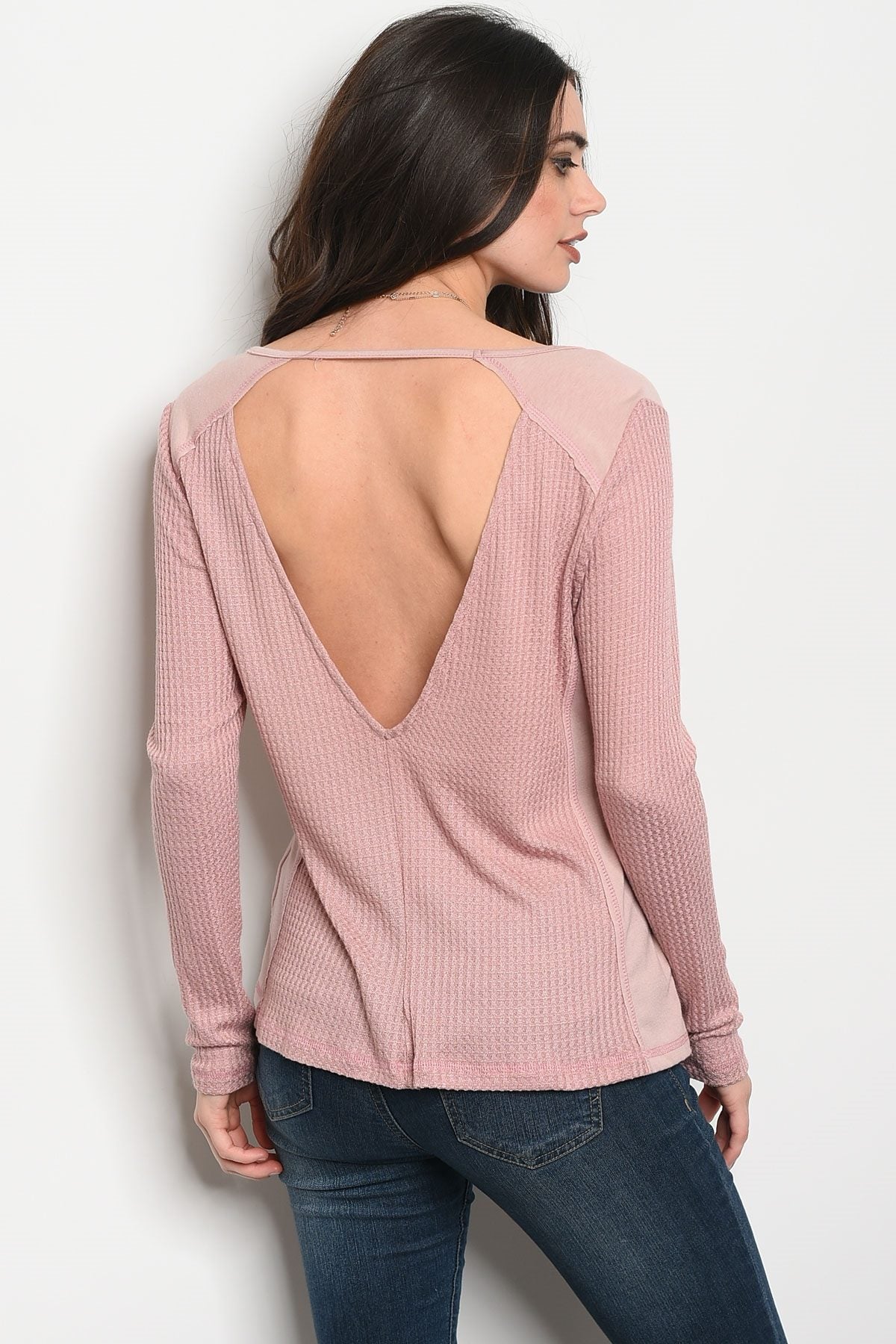 Ladies fashion long sleeve relaxed fit thermal top that features a v neckline