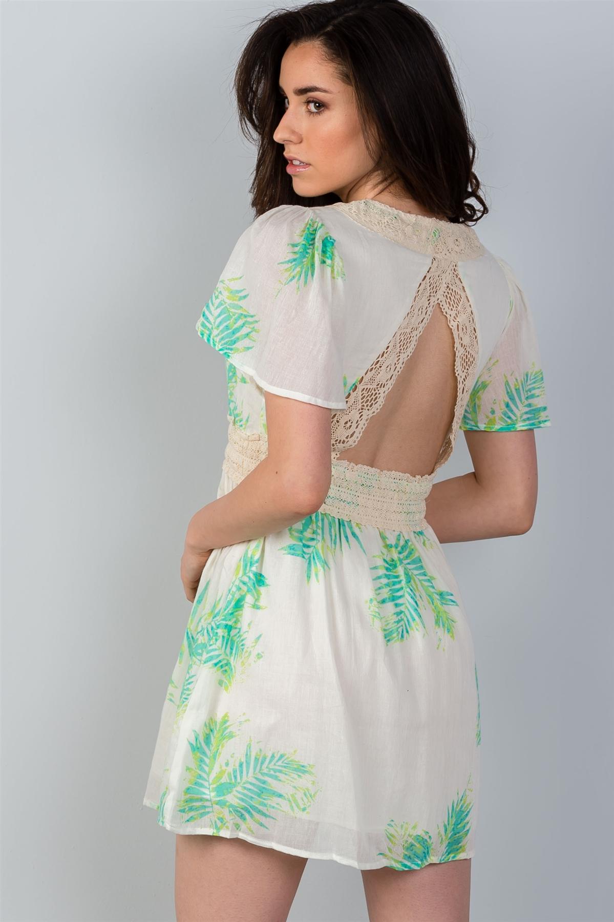 Ladies fashion crochet trim detail neckline button leaf print back cut-out mini dress