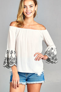 Ladies fashion 3/4 sleeve w/floral embo scallop hem off the shulder woven top