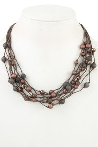 Faceted bead multi row necklace