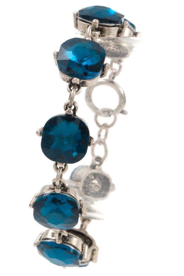 Faceted round framed gem bracelet