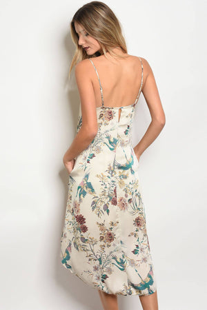 Ladies fashion sleeveless floral print satin slip style dress with a  v- neckline and a hi-low loose fit cut